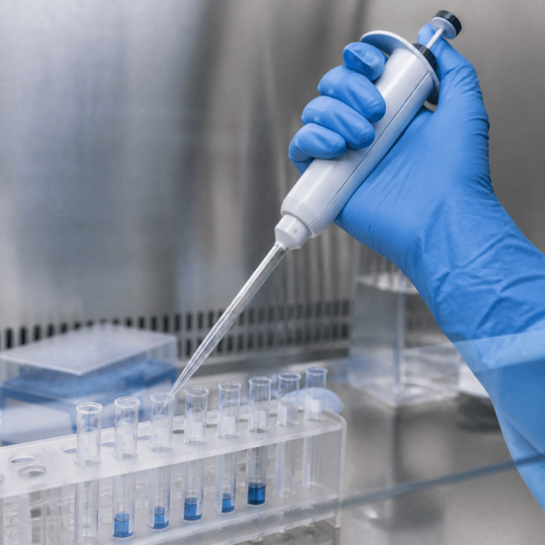 Sterility Testing shown as a gloved hand pipetting into a row of sample tubes